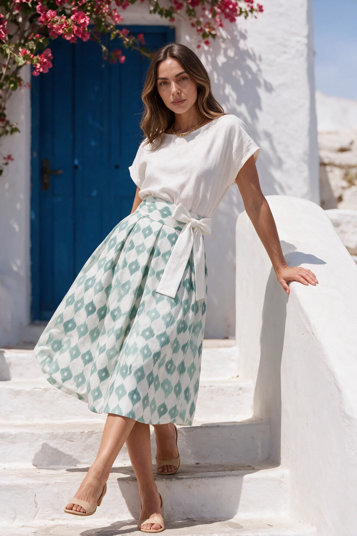 Kakara Skirt, Mint, worn at whitewashed island steps