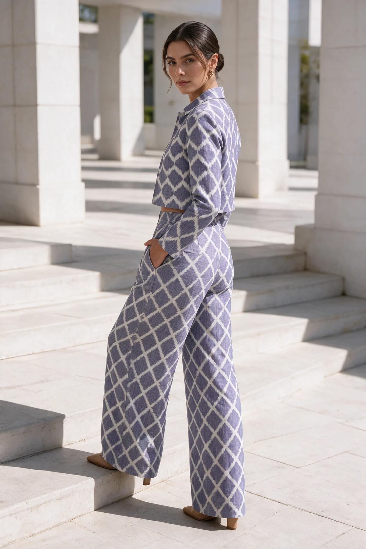 Badala Set, Periwinkle, worn at modern white-stone plaza