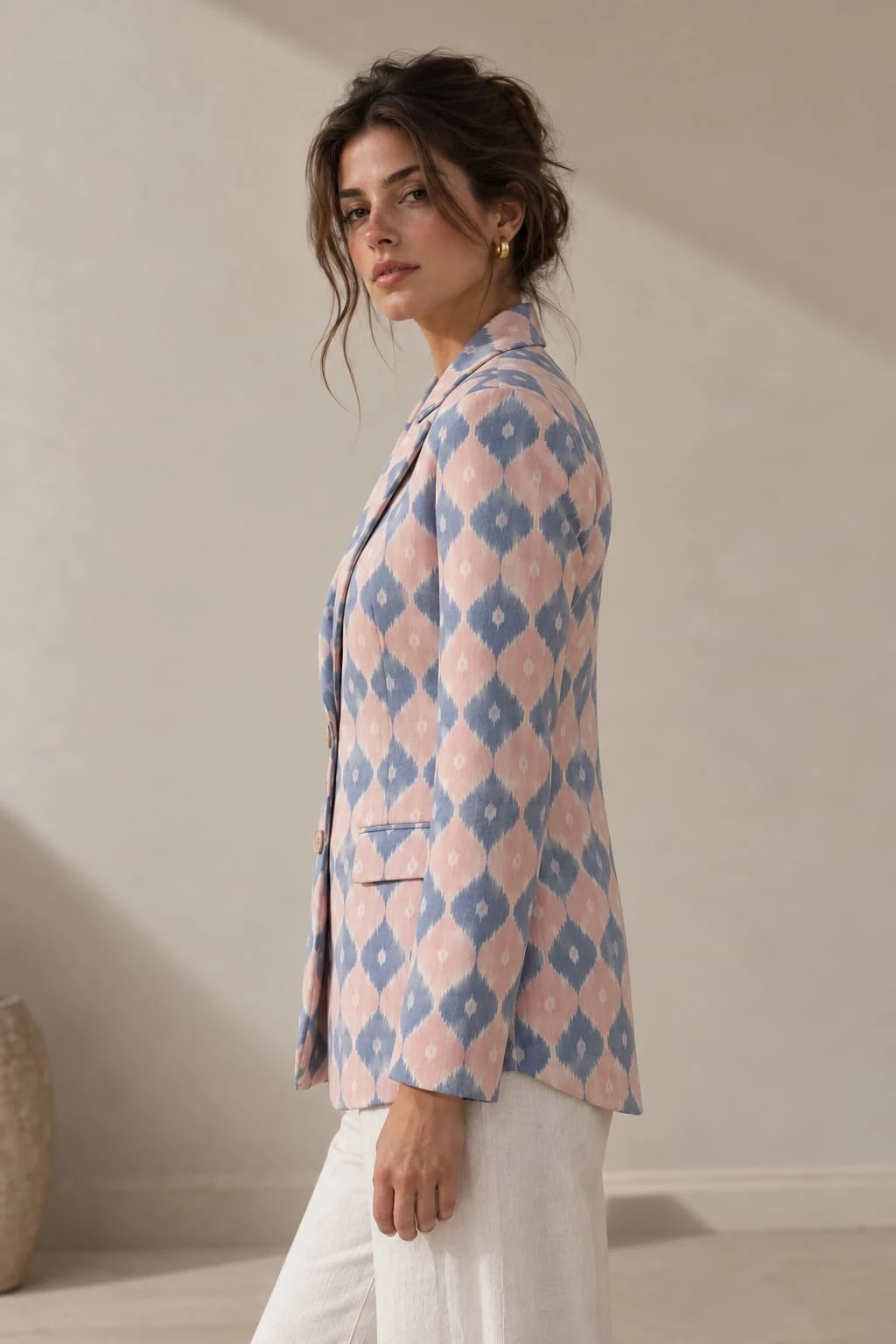 Side view of the dusty rose Chandua Blazer showing the hip-length hem